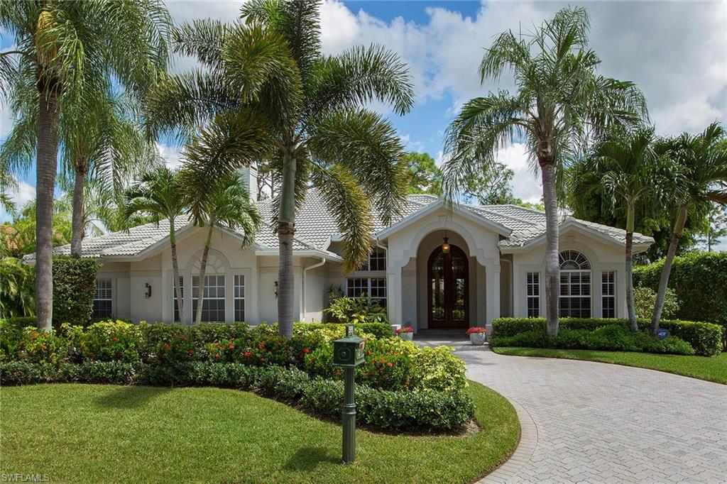 This exceptionally well-cared-for home is a wonderful combination of interesting design and superior view. Panoramic golf and lake vistas to enjoy from a large lanai with differentiated undercover areas, new outdoor kitchen, newly resurfaced and retiled pool with electric cover and gorgeous low-voltage lighting. Inside, you will find a master suite with updated bath leading to private den or office with warm wood built-ins. Formal living room and dining room are proportioned well. Open kitchen or family room and breakfast nook are surrounded by windows and renovated with new appliances, cabinets with pull-out drawers and granite countertops. Guests will love the privacy of a separate guest suite with pool access and morning kitchen. A bonus is the air-conditioned hobby room, studio or storage room located within the garage. From the new roof (2013) to the 3M film on all windows, this home has it all. Please contact listing agent for complete list of upgrades.