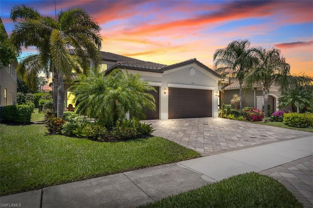 Welcome to this stunning Merlot floorpan by GL Homes, a breathtaking single-family home that boasts 5 spacious bedrooms and 4 full bathrooms, spread across 3,215 square feet of living space. The 3 car garage is large enough to safely store all of your toys! Upon entering you will instantly notice upgrades such as the warm wood flooring, dramatic iron & wood staircase, shiplap accent wall in the living room, plantation shutters throughout and more! The kitchen features quartz countertops, custom cabinetry, a gas stove top, and island big enough to fit more than four people at a time! The private guest quarters downstairs are perfect for hosting guests and making them feel right at home. In the evenings, take advantage of the beautiful screened in patio area and enjoy a delicious BBQ or take a dip in the 7 person salt water hot tub. The dog run on the side of the patio allows you to let your pets out with ease. Nestled in the heart of North Naples, Stonecreek is one of the most sought-after communities in the area. Conveniently located near top-rated schools, an array of dining and shopping options, and world-renowned beaches you'll love the amenities this community has to offer.