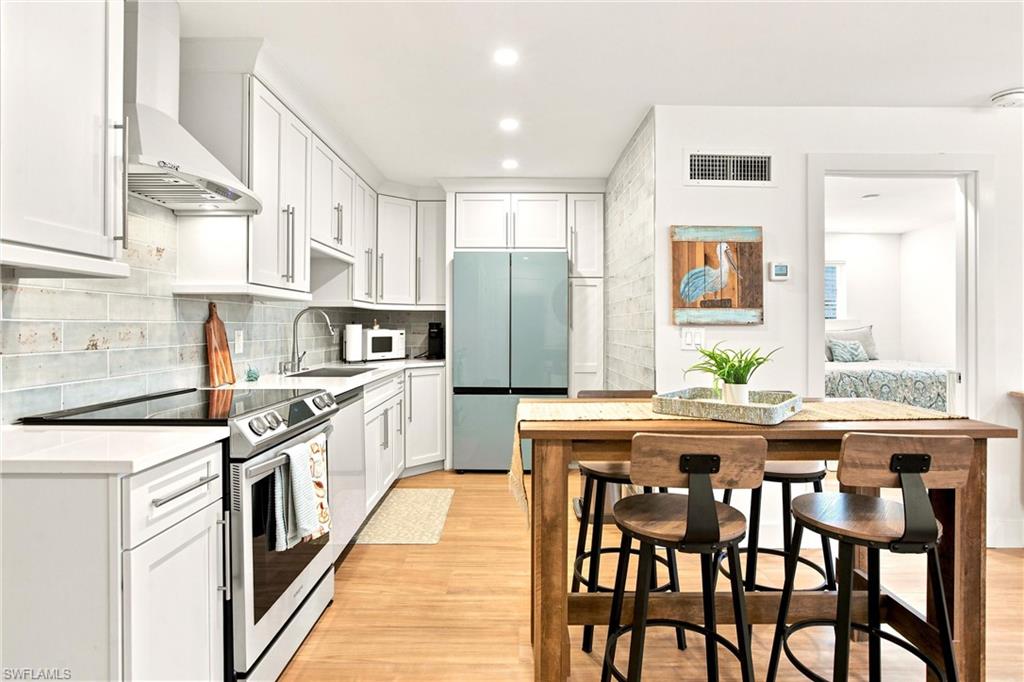 One of the best opportunities to own in the heart of Olde Naples! Beautifully renovated from top to bottom, this first-floor 1-bedroom, 1-bath residence combines timeless coastal style with an unbeatable location—all for just $280,000.
The bright, open floor plan features wood-look porcelain tile flooring throughout, recessed lighting, a stunning custom kitchen with quartz countertops, stainless steel appliances, a designer tile backsplash, abundant cabinetry, and a beautifully remodeled bathroom with an oversized walk-in shower. Every detail has been thoughtfully selected to create a sophisticated, move-in-ready retreat.
Located at 780 10th Avenue South, this charming condominium places you just a short stroll from both 5th Avenue South and 3rd Street South, where you'll enjoy award-winning restaurants, boutique shopping, art galleries, cafés, and entertainment. Naples' world-famous white-sand beaches are also just minutes away.
Whether you're searching for your own Olde Naples getaway, a home for a young professional, comfortable guest accommodations for family and friends, or an investment opportunity, this residence offers exceptional value in one of Naples' most sought-after neighborhoods.
Beautifully renovated. Prime Olde Naples location. Exceptional value. Rarely does an opportunity like this come along under $300,000.