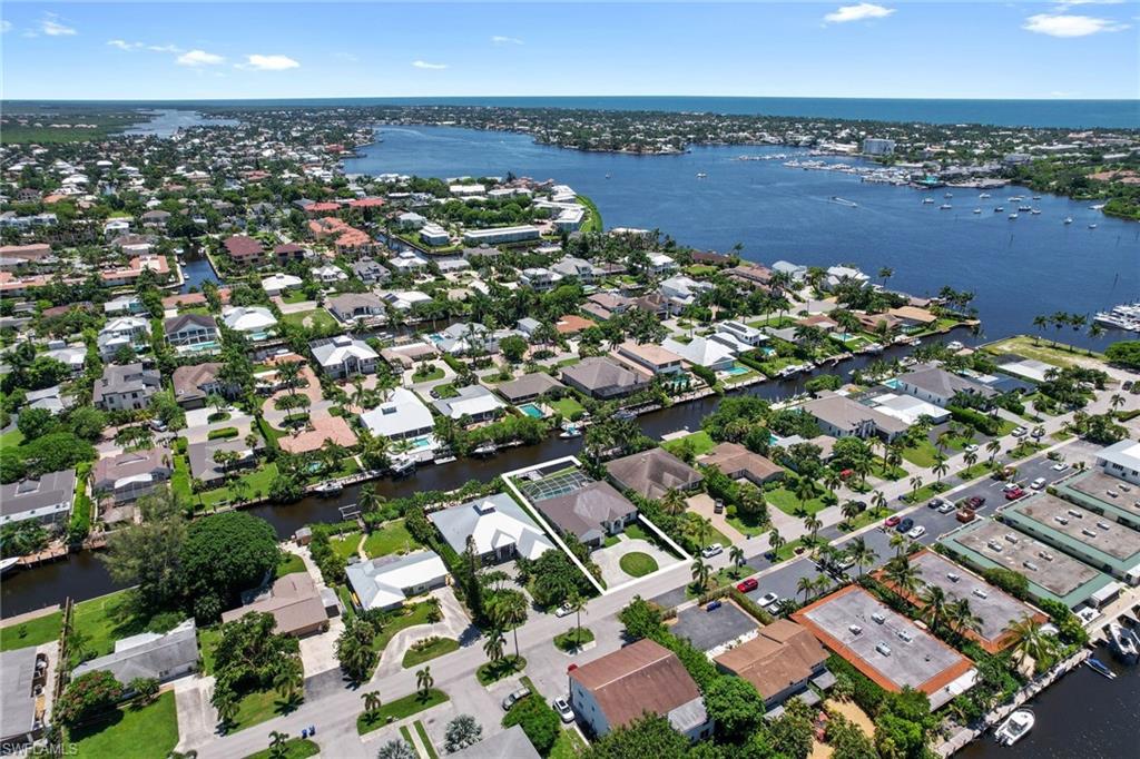 Don't miss this Royal Harbor area best buy opportunity. Walking distance to Bayfront and 5th Ave shops and restaurants. This 4BR 3BA pool home will not disappoint. Boat lover delight at direct bay and Gulf access with no bridges from your own dock with twin 30 amp shore power and water. New roof 2020. New HVAC to be installed before closing. New pool heater and pump 2021. New water heater 2018 all combine for carefree living. Great yard with southern exposure overlooking a large 15 x 35 lap pool.