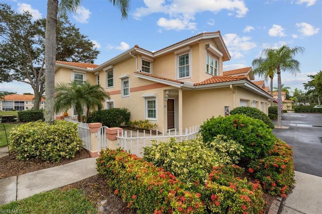 Welcome to Piper's Grove, an amenity rich and socially active community less than 5 miles to Vanderbilt Beach and walking distance to shopping, restaurants, and entertainment venues. This move-in ready, furnished carriage home features two bedrooms, a den, and two bathrooms in an open floorplan design with over 1900 square feet, charming fenced in courtyard area, AND AN ATTACHED GARAGE! Piper's Grove offers a recently remodeled clubhouse, mature landscaping, walking paths, fishing piers, 3 community pools, bocce ball, and tennis courts. Rest easy knowing all windows are protected by hurricane shutters, the roof was replaced within the last 2 years, and current owner replumbed the home removing all of the polybutylene piping. Piper's Grove is in the process of a complete transformation updating the community with a more modern paint palette on all buildings and entrances (already underway and assessment already paid by seller).
