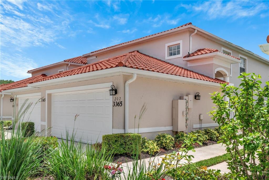 Spectacular Sunset & Golf Course Views!
Relax on your private lanai and enjoy breathtaking views overlooking the 4th green at Cypress Woods 
Golf & Country Club.  Watch golfers approach the green and sink their putts while you unwind with your favorite evening cocktail.  This beautifully maintained second-floor coach home features a renovated kitchen with elegant quartz countertops, stainless steel appliances, and stylish finishes. The spacious primary suite boasts a luxurious updated bath with a large walk-in shower with dual vanities. Offering flexible living space, the home includes two bedrooms plus a den that can easily serve as a third bedroom, home office, or hobby room.  Neutral decor throughout creates a warm and inviting atmosphere.

Major improvements completed in the past five years include:
*Kitchen and primary bath renovations
*Air-conditioning system
*Hot water heater
*Shutters
*Fixtures and ceiling fans
*Interior paint
*Appliances 

The attached two-car garage features a durable epoxy-coated floor and additional storage space for convenience.
Located in the first building beyond the community pool, you'll appreciate easy access for a refreshing swim or a relaxing afternoon in the sun.

Exciting enhancements are underway at Cypress Woods.  The golf course renovation is scheduled for completion with a grand opening January 2027.  Bocce courts, 8 pickleball courts are new with a resort-style feeling next to the clubhouse pool.

Experience the perfect blend of comfort. convenience, beautiful views in one of Naples' most welcoming and friendly communities.
