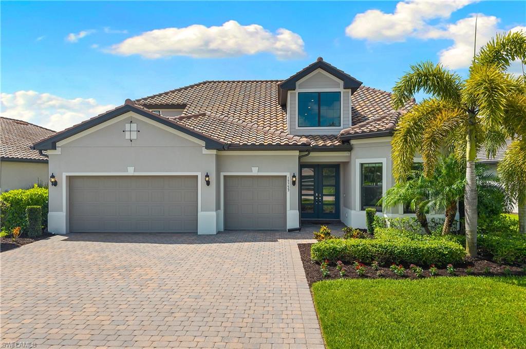 GORGEOUS (AND RARELY AVAILABLE) STONEWATER WITH LOFT RESIDENCE IS AVAILABLE NOW IN THE PLACE AT CORKSCREW! BREATHTAKING SOUTHERLY CENTER OF LAKE VIEWS! Built by Pulte Homes in 2021, this expansive home offers 4 Bedrooms + Den + Oversized Loft, 4 Full Baths, 3 Car Garage, 3,852sf of living area. The EXTENDED COVERED LANAI (13’ X 31’) provides endless outdoor living possibilities with dining and lounging spaces. The LANAI PRIVACY WALL is equipped with Electrical, Plumbing and Venting for your future CUSTOM OUTDOOR KITCHEN. The FULLY FENCED BACKYARD provides ample room for your kids and pets to play. There is tons of room to create your CUSTOM DREAM POOL OASIS if desired and still have room for a fence beyond the pool cage. From the moment you arrive, you are welcomed by a DECORATIVE DOUBLE DOOR ENTRY with Privacy Glass Inserts leading into a dramatic TWO-STORY FOYER with exquisite chandelier. Luxury Vinyl Flooring and Crown Molding accent the main living areas, Den and Primary Suite. The Greatroom boasts SOARING 12’ COFFERED CEILING, ACCENT WALL and GLASS SLIDING DOORS leading to your outdoor space. The GOURMET KITCHEN is a true showpiece appointed with the highest level "DIAMOND" DOVETAIL CABINETRY with SOFT CLOSE doors/drawers, ILLUMINATED STACKED UPPER CABINETS with glass inserts, QUARTZ COUNTERS with matching BACKSPLASH, UNDERCABINET LIGHTING, and STAINLESS STEEL APPLIANCES including a BUILT-IN REFRIGERATOR, microwave, wall oven, and cooktop. UPSCALE LIGHTING accents the KITCHEN ISLAND with end caps for additional storage. The WALK-IN PANTRY is complete with BUILT IN SHELVING and BEVERAGE REGRIGERATOR. The Den is accented by a TRAY CEILING, WOOD TRIM FEATURE WALL and CUSTOM BUILT-IN DESK AND CABINETRY. Retreat in the luxurious first floor Primary Suite with TRAY CEILING and joined by a SPA INSPIRED PRIMARY BATH with HEAVY GLASS ENCLOSED SHOWER, FLOOR-TO-CEILING CARRARA STYLE TILE, DUAL VANITIES with TRIMMED MIRRORS, QUARTZ COUNTERTOPS and a walk in closet with CUSTOM CLOSET ORGANIZERS. Guest accommodations include spacious secondary bedrooms and bathrooms. The front bedroom presents a BAY WINDOW with a BUILT-IN WINDOW SEAT. The Laundry Room is appointed with WHITE CABINETRY, SINK, QUARTZ COUNTERTOPS, HIGH END FRONT LOAD WASHER AND DRYER, and ACCENT WALL with HOOKS for added organization. Upstairs, the OVERSIZED LOFT offers flexibility for a media room, game room, fitness area or additional living space joined by an additional bedroom and full bath. The home is equipped with IMPACT RESISTANT WINDOWS AND DOORS, WHOLE HOME WATER FILTRATION and VITEX SECURITY SYSTEM. Amenities at The Place include: Resort Pool w/100' Waterslide, Indoor Restaurant, Bourbon Bar, Cafe, Outdoor Bar, Fitness Center, Movement Studio, Tennis, Pickleball, Bocce, Basketball, Playground, Dog Park, Childwatch and Spa Services. PUBLIX GROCERY STORE IS JUST 1.4 MILES AWAY. TENANTS INCLUDE DUNKIN, UPS STORE, LEGNO ITALIAN RESTAURANT, NAIL SALON, HEARTLAND DENTAL AND MORE!
