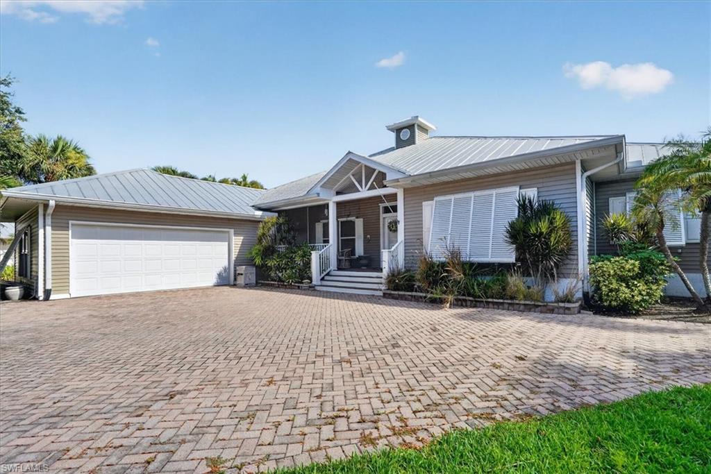Welcome to the relaxed elegance of Southwest Florida living in Caloosa Creek, a desirable gated Old Florida-style community where coastal character, tropical surroundings and an exceptional location come together beautifully. From the moment you arrive, this inviting 3-bedroom plus Den/Office pool home captures the essence of the Florida lifestyle, light and bright Great Room floor plan, lush landscaping & spacious outdoor living areas.

Situated on an oversized corner lot, the property offers an impressive sense of space, privacy and tranquility. The large fenced yard allows pets to be playful & provides a wonderful setting to enjoy the outdoors surrounded by mature tropical landscaping. Whether entertaining friends, relaxing in the sunshine or enjoying a quiet evening at home, this property was designed for effortless indoor-outdoor Florida living.

At the heart of the home is the open Great Room floor plan, filled with natural light and offering an easy, comfortable flow for everyday living and entertaining. The flexible Den/Office provides the perfect space for a private home office, reading room, media room or additional guest accommodations.

Step outside to your own private tropical retreat featuring a heated swimming pool, above-ground spa and generous pool deck constructed on a stem wall. The expansive outdoor living area invites you to relax poolside, unwind in the spa, entertain family and friends or simply enjoy Southwest Florida's beautiful year-round climate. Lush landscaping enhances privacy and creates a serene resort-style setting right at home.

Additional features include a desirable metal roof, county water and a private well dedicated to the irrigation system—an excellent benefit for maintaining the property's beautiful tropical landscaping.

The home has also benefited from several recent improvements, including the HVAC system, microwave and flat-top stove replaced in 2022; refrigerator and dishwasher replaced in 2023; and pool pump replaced in June 2026.

Caloosa Creek offers the charm and character of an Old Florida coastal community with sidewalks ideal for morning and evening strolls and an array of amenities, including a community swimming pool, tennis courts and clubhouse. Enjoy the privacy of a gated community with LOW HOA fees of only approximately $700 quarterly.

The location is exceptional—conveniently close to Gulf beaches, shopping, dining, restaurants, hospitals and medical facilities, as well as major roadways providing easy access throughout Southwest Florida.

This is more than a home, it is an opportunity to embrace the Southwest Florida coastal lifestyle. A private heated pool, above-ground spa, oversized fenced corner lot, lush tropical surroundings, flexible living space and a charming community combine to create a truly special place to call home.

Experience the relaxed elegance, tropical beauty and timeless Old Florida charm of Caloosa Creek. Your Southwest Florida lifestyle awaits!
