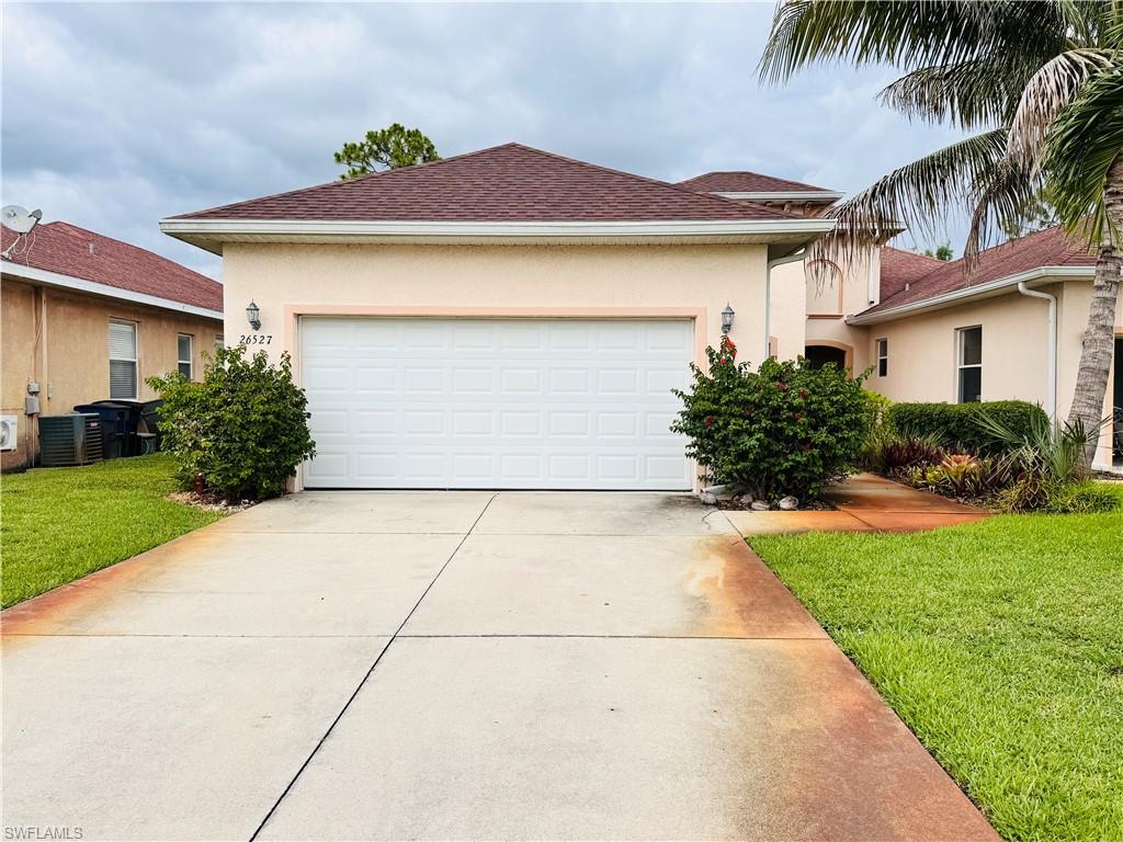 Available now! This beautifully updated 3-bedroom, 2-bath villa with a 2-car garage offers comfortable Florida living with a screened lanai overlooking a peaceful water view. Recent upgrades include fresh interior paint, new carpet in the bedrooms, a new roof, and newer appliances, giving the home a fresh, like-new feel. Lawn care is included for added convenience.  Ideally located in the heart of Bonita Springs, this home is just minutes from downtown Bonita Springs, the exciting Mid-Town Bonita development, Coconut Point Mall, Southwest Florida International Airport (RSW), and the area's beautiful white sand beaches. Enjoy easy access to shopping, dining, entertainment, and endless outdoor recreation from this centrally located villa.