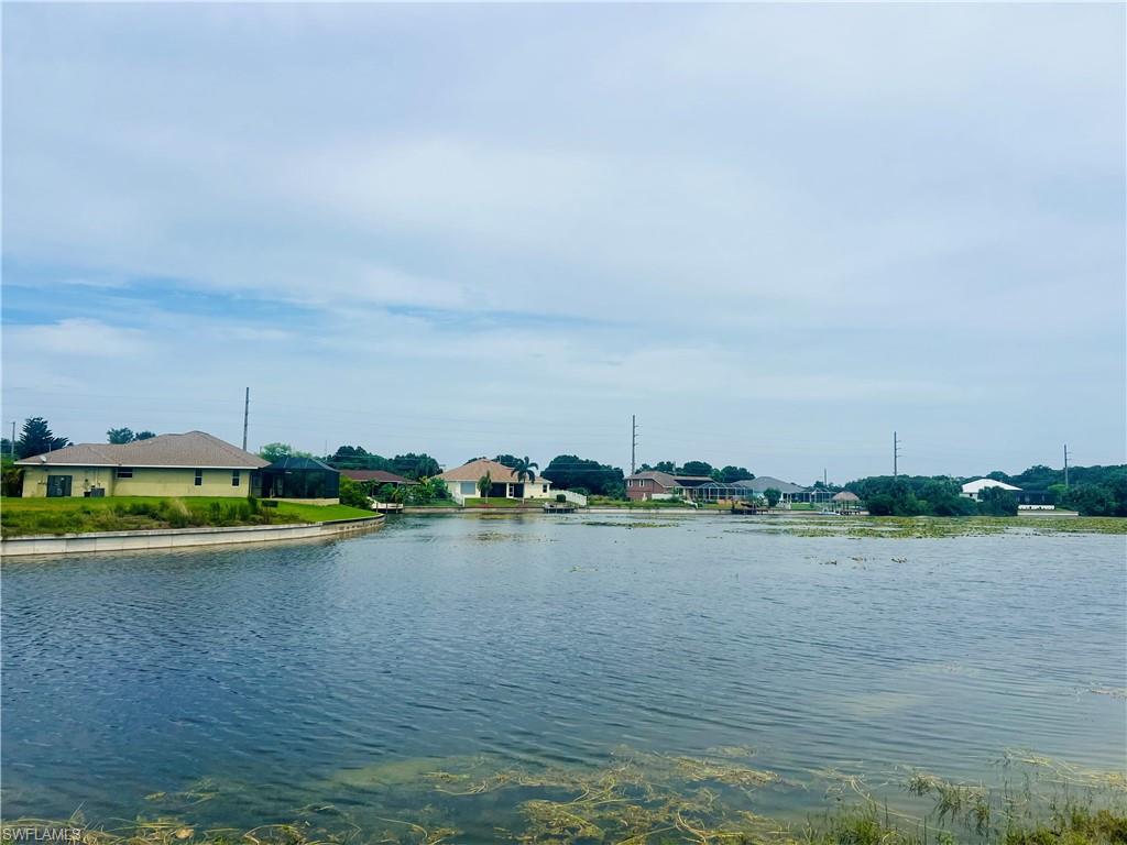 OVERSIZED TRIPLE FRESHWATER LOT – NO FLOOD ZONE – PARTIAL LAKE VIEW!

This beautiful residential property, totaling 0.344 acres, is located in one of Cape Coral's growing areas. With eastern rear exposure and a partial lake view, you'll wake up to peaceful water views and beautiful Florida sunrises. The extra lot size gives you plenty of room to build a larger custom home, add a pool, create an outdoor entertaining space, or simply enjoy the added privacy that is hard to find.

Situated on a freshwater canal, this property offers a partial view to Garden Lake, with Nectar Basin just a short ride along the canal, giving you even more room to explore Cape Coral's extensive freshwater canal system. Spend your days fishing, kayaking, canoeing, paddleboarding, or simply enjoying the peaceful waterfront setting.

The surrounding area is seeing continued growth, with beautiful newer homes and ongoing construction adding to the neighborhood's appeal. Conveniently located near shopping, restaurants, schools, parks, medical facilities, and everyday essentials, this is an excellent opportunity to build your dream home or invest in one of Southwest Florida's fastest-growing communities.