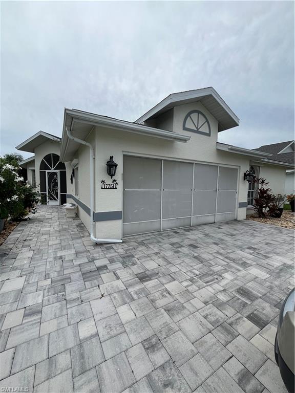 Welcome to 17751 Pineapple Palm Court, a beautifully maintained and thoughtfully updated home in the highly desirable Sabal Springs community, offering peaceful pond and golf course views, exceptional curb appeal, and wonderful indoor and outdoor living space.
From the moment you arrive, you will appreciate the beautifully manicured landscaping, mature tropical plantings, and meticulous exterior that create an inviting first impression. The spacious two-car garage features a full sliding screen enclosure, allowing you to enjoy fresh air while using the garage as an additional comfortable and versatile space.
Inside, this impressive home offers far more than a traditional floor plan. A beautiful bonus television room provides the perfect place to relax or entertain, while the separate den offers flexibility for a home office, reading room, hobby space, or additional guest accommodations.
The bright and welcoming interior features attractive Florida-inspired finishes, fresh paint, and exceptionally well-maintained tile flooring. The kitchen is equipped with newer appliances, and the remodeled bathrooms provide a stylish and updated feel.
The expansive outdoor living area is truly outstanding. A double screened lanai with an additional extension provides abundant room for dining, entertaining, relaxing, and enjoying the tranquil pond and golf course scenery.
Major improvements include a newer roof, newer HVAC system, completely updated plumbing, a newer hot water heater, and electric roll-down hurricane shutters throughout the home. These valuable upgrades offer convenience, comfort, and peace of mind.
Offered partially furnished and located within the welcoming 55+ gated golf community of Sabal Springs, this exceptional home combines beautiful curb appeal, flexible living areas, extensive outdoor space, valuable updates, hurricane protection, and the best of the Florida lifestyle.