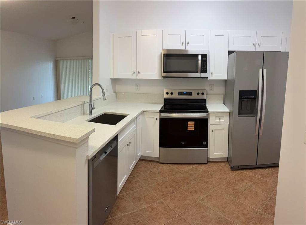3 bedrooms, 2 bathrooms, tiled through out and is an end unit located on second floor.  No one above you.  Offers an open floor plan with vaulted ceilings that create a light, spacious feel.  Ceiling fans in all 3 bedrooms.  Bellamar at BeachWalk is a gated condominium community located in South Fort Myers, minutes from Fort Myers Beach, Sanibel & Captiva Island.  Community amenities include heated community pool, hot tub and exercise room located at the clubhouse. The private screened balcony gives you the perfect place to relax, entertain, or enjoy the Florida breeze.  Very pretty remodeled kitchen with quartz countertops, stainless steel appliances, and cream color shaker-style cabinets.   The split-bedroom layout provides privacy for both owners and guests. The spacious primary bedroom offers a large walk-in closet and a fully renovated bathroom, tiled walk in shower and vanity. Two additional bedrooms share a recently remodeled guest bathroom with a shower/tub combination. New a/c unit and ductwork will keep your electric bill down this summer.   Conveniently situated near beaches, restaurants, shopping, Health Park hospital and entertainment.  You’re also just a short drive to the airport and  downtown Fort Myers.  Take a look at the pictures and call to make this condo your new home.  Sorry pets are not permitted for tenants according to HOA rules and regulations.