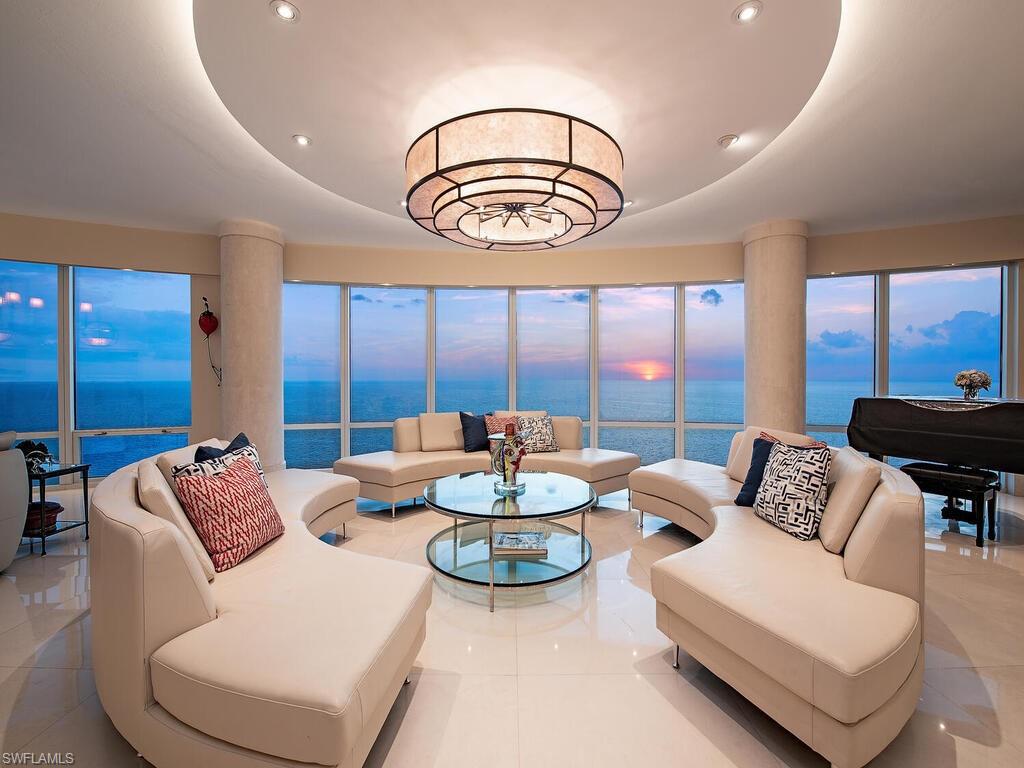 Multiple exposures from floor-to-ceiling glass offer an abundance of West, North, and South-facing views over the Gulf of Mexico, Venetian Bay, and beyond.