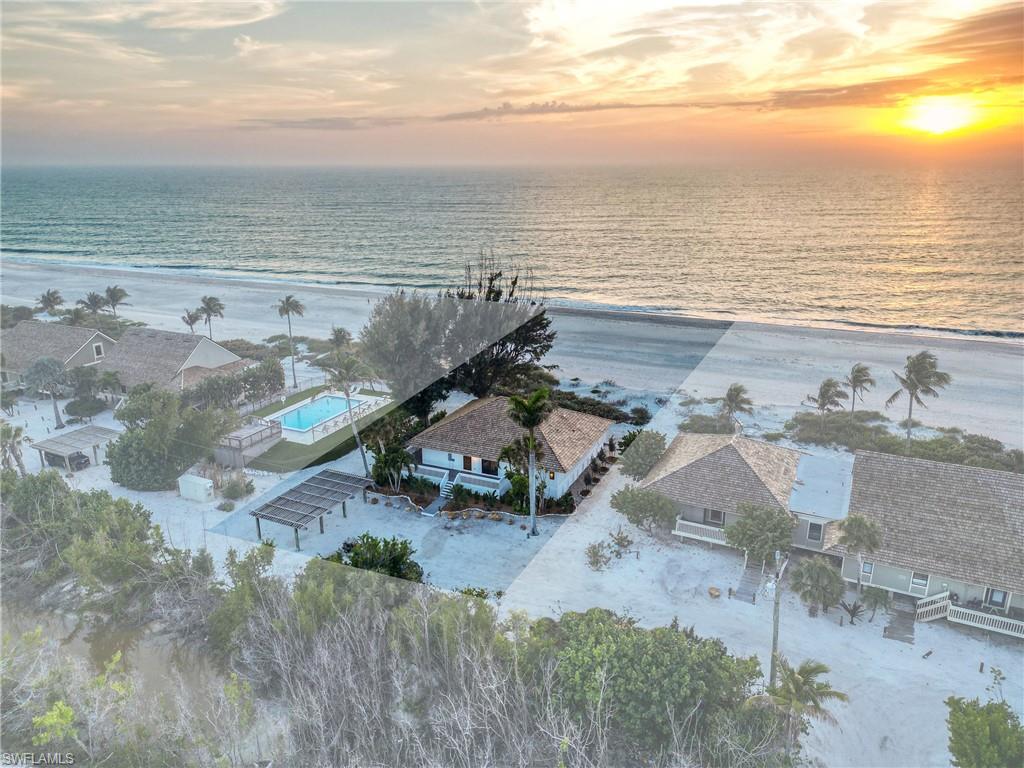 Experience breathtaking Gulf front views from this stunning MOVE-IN-READY 4-bedroom, 4-bathroom Beach Home. Meticulously reconfigured and renovated, this residence seamlessly blends the bespoke charm of a custom home nestled within a serene, low-density community. Step inside to discover a masterfully designed interior adorned with board and batten walls, tile flooring, and coastal furnishings that evoke a sense of laid-back sophistication. The kitchen is a chef's dream, boasting Café appliances, Quartz countertops, a stylish tile backsplash, and custom-built wood cabinetry, all complemented by gas cooking. In 2024, the property underwent a comprehensive remodel, including upgrades to plumbing, electrical systems, and the installation of tank-less hot water. Outside, impact windows and 8-foot sliding glass doors frame captivating views, while no-show cable railings enhance the aesthetic appeal. Lush landscaping surrounds the home, creating an oasis of tranquility. Recent enhancements include a new roof; fresh exterior paint courtesy of the association coming soon. Owners also enjoy access to three pools and tennis court within the vibrant Beach Home Community.