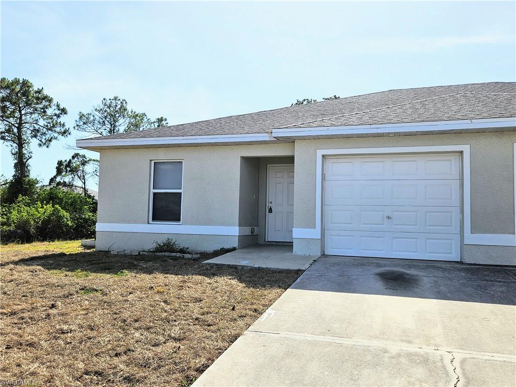Now Available for Rent! Welcome to this spacious and well-maintained 3-bedroom, 2-bathroom duplex with an attached 1-car garage. This freshly painted home features easy-care tile flooring throughout, offering both comfort and convenience with no carpet.

Enjoy a functional layout with a bright living area, in-home washer and dryer hookups, and a brand-new garage door opener for added convenience. Located at the end of the block, this property provides a quieter setting while still being centrally located near shopping, dining, and everyday essentials, with quick access to major roads and highways for an easy commute.

Lawn care and salt service are included in the monthly rent. Sorry, no pets allowed.

Schedule your showing today and make this Lehigh Acres duplex your next home!