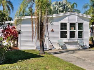 Affordable South West Florida living!   Whether you're a full time resident or a snowbird you can't beat this for a home in Paradise.  55+ community with loads of amenities and activities.  Recently installed vinyl plank flooring and new ceiling.  This home is located directly across the street from the clubhouse, pool and tennis courts.  Allappliances stay including washer & dryer.   Owner will also throw in a storage trailer that is kept on the property.  This is one of the larger units at this price point.  Community is conveniently located in Estero minutes away from Miromar Outlet Mall, Coconut Point, lots of restaurants and the airport.