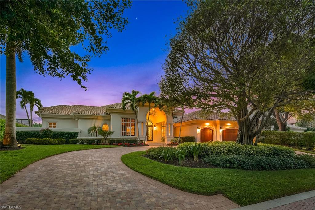 Nestled within the exclusive Jamestown enclave of Pelican Bay's gated community, this meticulous home sprawls on a southwestern exposed lot with both exceptional lake and golf course views. Step into the interior with 4 beds, study & 4 1/2 baths, each space showcasing thoughtful design, creating a seamless indoor-outdoor connection with a light and bright ambiance. The gourmet kitchen sets the stage for stylish gatherings opening to the family room and wet bar which transitions effortlessly to the inviting outdoor spaces surrounding the sparkling pool—a sanctuary for relaxation with expansive views. An impressive master suite and spacious bedrooms offer comfort, style and quality. Experience Pelican Bay's luxurious lifestyle with prime access to exceptional amenities in close promenade and nearby shopping, dining and entertainment options. Embrace the epitome of Naples living in the highly-sought after Pelican Bay neighborhood.