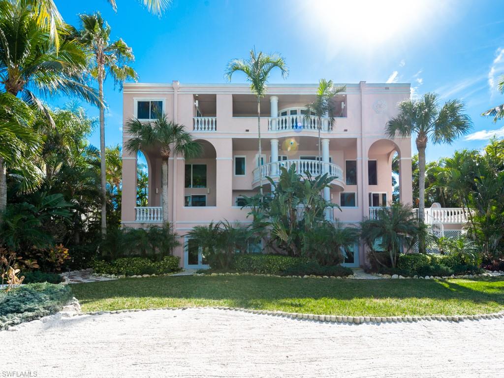 Beautifully remodeled bayfront home on a quiet East end cul de sac. Meticulous attention to detail in every facet of this 4-bedroom, 5.5 bath home that exudes elegance from the moment you enter the grand foyer. White oak and imported stone flooring in the living areas as well as custom woodwork and cabinetry throughout. Main level has a chef’s kitchen with top of the line appliances and open floor plan to family room with floor to ceiling windows offering breathtaking views of San Carlos Bay as well as a fireplace. There is a raised pool and spa just outside. There are also formal living and dining rooms. Every major room in the home has a private bayfront terrace. The owner’s suite is on the top floor with exquisite his and her bathrooms, morning kitchen, fireplace, large closets, and washer/dryer. Three additional bedrooms all ensuite with bathrooms boasting exotic granite. Additional features include an elevator, impact doors and windows, Lutron lighting, and Sonos system.