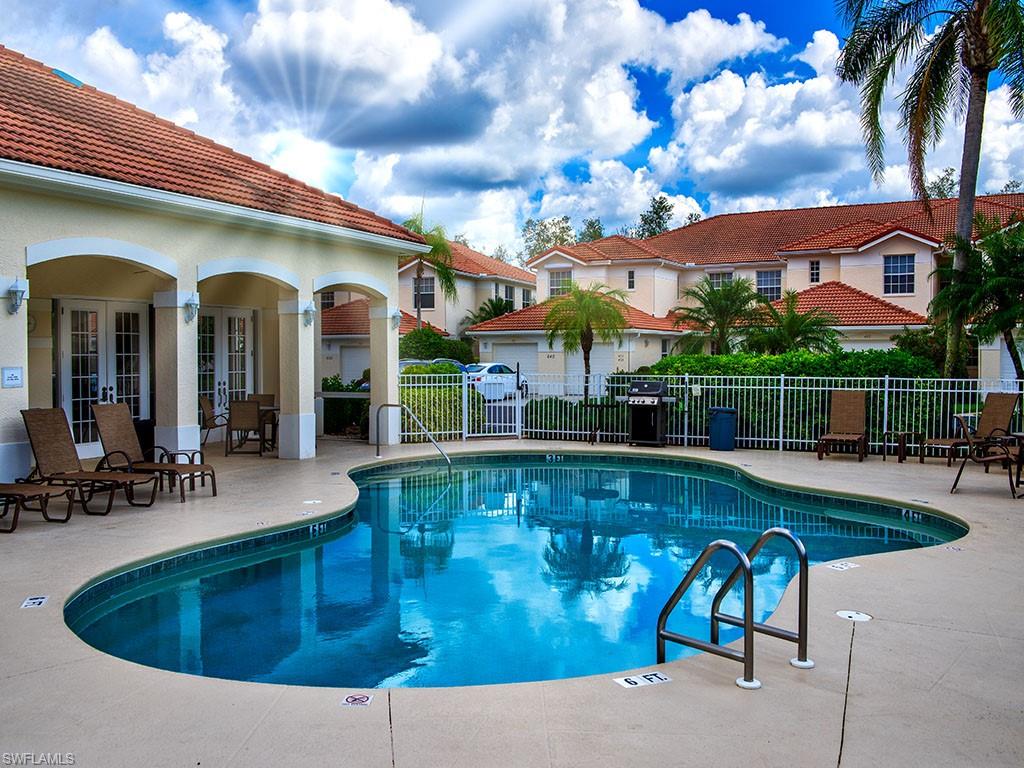 BACK ON THE MARKET AND PRICED TO SELL!! Don't miss this beautiful first floor, 2 bedroom, 2 bathroom, plus den home with an attached garage in the pet friendly Lalique community within the Vineyards. Walking distance to Vineyards Elementary School, Ave Maria Law School, and all of the amenities of Vineyards Park PLUS it is zoned for all A-RATED schools! NEW HVAC AND HOT WATER HEATER 2017/NEW WASHER 2019. Tranquility and privacy await you on the enclosed lanai overlooking lush greenery and just steps from the community clubhouse, pool and spa, exclusive to this small community of just 104 residences. The home's central Naples location allows easy access to I-75, shopping, restaurants, and Physicians Regional Hospital. HOA fees include cable, internet, phone, water, garbage, landscaping, irrigation, community amenities, and more.