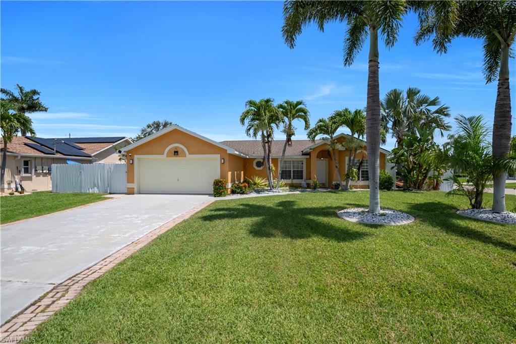 Welcome to this beautifully maintained 4-bedroom, 2-bathroom pool home situated on a desirable corner lot in the heart of Cape Coral. Offering 1,684 sq. ft. of living space and 2,103 total sq. ft., this home combines comfort, efficiency, and exceptional value.
Enjoy your own private backyard oasis featuring a heated swimming pool and spa, perfect for year-round relaxation and entertaining. The property is equipped with solar panels that include a transferable warranty, providing long-term energy savings and added peace of mind for the new owner.
Major updates include a complete re-pipe completed in 2019 and a new water treatment system, enhancing the home's reliability and functionality. The spacious split-bedroom floor plan, attached 2-car garage, and generous corner lot make this property ideal for families, seasonal residents, or anyone looking to enjoy the Southwest Florida lifestyle.
Conveniently located near schools, shopping, dining, parks, and major roadways, with easy access to all that Cape Coral has to offer.
Don't miss this incredible opportunity to own a move-in ready home with premium upgrades. Schedule your private showing today!
