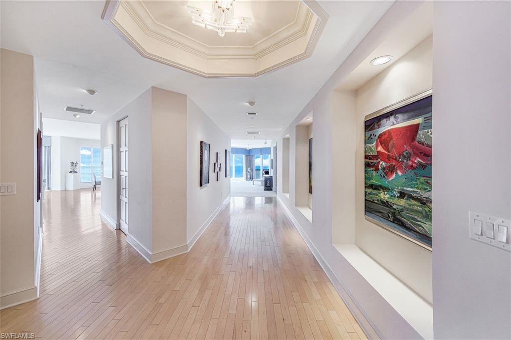 BEST VALUE IN PROVENCE AT $1,099.83 PER SQUARE FOOT!  PROVENCE AT PARK SHORE LUXURY BEACHFRONT CONDO ~ One of a kind expanded floor plan by developer with 4,728 sf under air and 3 lanai’s adding another 508 sf. The foyer welcomes you into a space designed for entertaining with nearly 500 sf of living/dining room and a 700 sf family room. TEN FOOT CEILINGS and 8 foot doors. 4 Bdrm/5 Bath plus Den. TWO DEEDED PARKING SPACES NEAR THE ELEVATOR.  Freshly painted throughout, Silhouette electric blinds, new custom draperies. WATER VIEWS FROM EVERY ROOM of the Gulf & Venetian Bay. Separate entrance through laundry room. TWO PETS ALLOWED.  Provence is an amenity rich building with gated access, 24 hour front desk, three guest suites, tennis, fitness center, sauna, steam room, massage room, pool/spa, large social room, and car wash. Boat docks are available at Venetian Bay Yacht Club. Plenty of storage in the unit, plus a large climate controlled storage area. To the east, you’re just steps to the fine dining and shopping at Venetian Village. To the west, the Park Shore beach walk & Gulf of Mexico. Just a short drive to Waterside Shops, Artis Naples, Mercato, 5th Avenue & Third Street South.