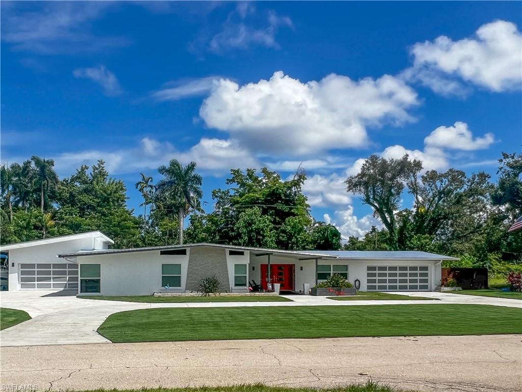 Step inside this truly iconic mid-century oasis nestled in the heart of the highly desirable McGregor Corridor. This beautiful home designed by famed architects Paul Rudolph and William Frizzell boasts timeless architectural elements, coupled with modern features. As you enter into the inviting open concept that connects the living room, kitchen and dining room you see the new massive sliders that open to the large outdoor living space inviting you to maximize the ideal indoor/outdoor living space that mid-century homes are known for. Off the kitchen is a guest bedroom, and down the hallway are the rest of the bedrooms. Located in the primary bedroom are 2 large closets, and a primary bath sure to whisk you into spa dreamland. The outdoor living space is enclosed with a full panoramic enclosure, a heated pool with waterfall, a covered patio with 2 ceiling fans and an outdoor bar. 2 separate garages that make for easy 5 car storage complete this home. The newly built garage is a 3-car tandem that has a garage door in the front and one in rear that opens to your lush backyard allowing ease of access. It also boasts an electric car lift! With so many new updates and upgrades there is too much to list in this description. This is a must-see home that has been transformed for many more generations of enjoyment. Itemized list of upgrades available.