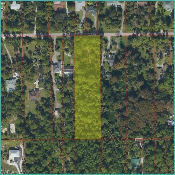 Build your dream home on this rare 2.5-acre, 100% UPLAND lot in a prime Naples location! Conveniently located near the intersection of White Blvd and Collier Blvd (951). Enjoy plenty of space for a custom home, guest house, workshop, RVs, boats, with no HOA restrictions and just minutes from shopping, dining, schools, and everyday conveniences. A fantastic opportunity to own a high-and-dry lot in one of Naples' fastest-growing areas.