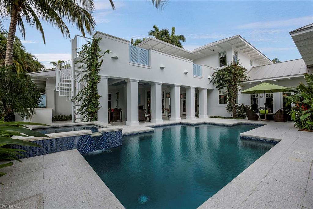 Experience what is truly one of the finer Old Naples homes south of the Beach Club! Designed by renowned Naples architect Jerry De Gennaro and built to the exacting standards of Frontier Custom Homes, this luxury four-bedroom, four-full- and two-half-bath residence has the quality, features and specifications to meet the requirements of the most discerning buyer. Some of the features include Brazilian cherry flooring, Florida cypress ceilings, Crestron automation, security system with six exterior security cameras, complete Viking appliance package and a 100 kW stand-by generator. Also included is an al fresco dining area, outdoor grill with private patio, large sunning deck, five-car garages and lush tropical landscaping. The location is a highly coveted mahogany-tree-lined street, and the home is only one block from the beach. This is the ultimate Old Naples luxury home.