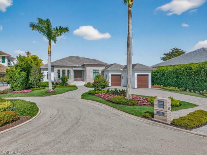 Home with a view!
Located in the prestigious Park Shore neighborhood, on one of the quietest streets, 4120 Willowhead Way is a stunning single-level custom estate. This 2020 built masterpiece by Toscana Homes and Stofft-Cooney Architects seamlessly blends soft contemporary design with approximately 3,900 square feet of refined living space. 
Inside, the home features rich wood flooring, custom shaker cabinetry, wood coffered tray ceilings, and electric drapery. The gourmet kitchen, featuring Wolf and Sub-Zero, is a chef's dream. The expansive master suite complete with a separate seating area, heated bathroom floors, and a freestanding tub, provide an unparalleled retreat. Modern convenience is integrated throughout, including a Crestron home automation system and a full-home reverse osmosis water system.  
The outdoor living area is a private oasis, featuring a resort-Style Lanai, complete with roll-down screens and shutters. The lap pool and integrated spa are perfect for exercise or relaxation.
The summer kitchen is ideal for entertaining while overlooking the sparkling lake. 
Situated on a quiet cul-de-sac with just nine homes, this residence is a close to amenities like Venetian Village, Waterside Shops, Publix and Starbucks. Residents also enjoy the option to join the Park Shore Beach Association and lease boat slips in Venetian Bay.
Don't miss out on this beautiful competitively priced home and schedule your private tour today.
Home is being offered with a 1 year builder home warrantee.