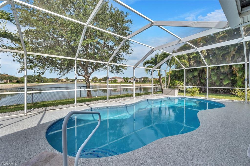 Experience the perfect blend of luxury, comfort, and waterfront living in this beautifully updated 4-bedroom residence. Ideally positioned on an oversized lakefront homesite, this exceptional property offers breathtaking water views, a sparkling private pool, and an expansive driveway providing ample parking and impressive curb appeal.
Designed for modern living, the home features spacious open-concept living areas, soaring ceilings, abundant natural light, and stylish finishes throughout. The beautifully renovated bathrooms showcase contemporary design and upscale touches, while the thoughtfully designed floor plan offers generous living space for both everyday enjoyment and entertaining.
Step outside to your private backyard oasis where the pool overlooks tranquil lake views, creating the ultimate setting for relaxation, family gatherings, and unforgettable sunsets. Mature landscaping and a wide homesite enhance the sense of privacy and space rarely found in today’s market.
Located in one of Naples’ most desirable communities, this move-in-ready home combines modern updates, spacious living, stunning outdoor amenities, and an unbeatable Florida lifestyle. A rare opportunity to own a beautifully maintained lakefront pool home that truly has it all.