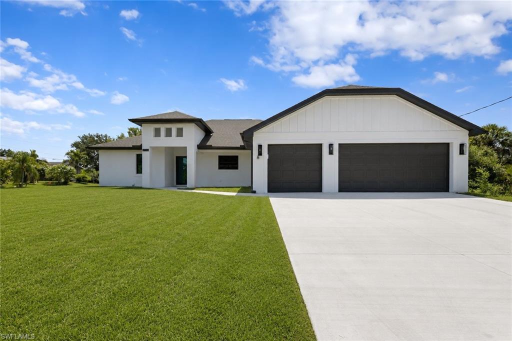 Experience elevated Florida living in this brand-new Buckingham home featuring 3 bedrooms, 2 bathrooms, a spacious 3-car garage, and an oversized corner lot. Fully upgraded throughout, this home combines modern style with thoughtful design.  The stunning two-tone kitchen is the heart of the home, complete with stainless steel appliances, a large pantry, and plenty of space for entertaining. The showpiece of the main living area is the expansive wall of sliding glass doors, filling the home with natural light while creating a seamless indoor-outdoor flow to the oversized under-truss lanai. The private primary suite is a true retreat, featuring its own sliding glass doors overlooking the lanai and backyard, a luxurious walk-in shower with a glass enclosure, and an impressive walk-in closet that won't disappoint. A desirable split-bedroom floor plan provides privacy for both homeowners and guests, making the layout as functional as it is inviting. Located in the growing Buckingham community, you'll enjoy the peaceful feel of country living without sacrificing convenience. Just minutes from Fort Myers and with quick access to I-75, commuting is a breeze. Buckingham offers plenty to enjoy close to home, from fresh produce and farm-to-table dining at Buckingham Farms to live music at the Buckingham Blues Bar. Nature lovers will appreciate nearby Buckingham Park and the scenic Buckingham Trails Preserve, making this an ideal location for those seeking both tranquility and accessibility.