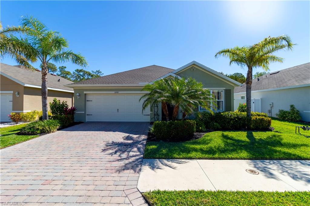 A PRIVATE BRICK PAVER PATIO framed by mature shade trees and FULLY FENCED for privacy is just the beginning of what makes this Bonita Springs rental stand out. Step outside to a backyard that actually lives — quiet, landscaped, and ready for evenings with nowhere to be. Inside, the home is thoughtfully maintained and move-in ready. The kitchen is the anchor of the main living space — RAISED-PANEL CABINETRY with crown molding details, GRANITE COUNTERTOPS, a large KITCHEN ISLAND with bar seating, STONE TILE BACKSPLASH, and a full suite of STAINLESS STEEL APPLIANCES, all dressed with wrought iron pendant lighting that sets the tone. The open layout flows naturally into the dining area and main living room, where PLANTATION SHUTTERS, CROWN MOLDING, and TILE FLOORING carry through every room. Three bedrooms each offer WOOD-LOOK FLOORING, PLANTATION SHUTTERS, and ceiling fans — the primary suite featuring its own private bath with a glass-enclosed walk-in shower. The two-car garage and BRICK PAVER DRIVEWAY round out a curb appeal that turns heads in the neighborhood. Landscaping, high-speed internet, and pest control are all included. Pets welcome. Located in one of Bonita Springs' most established residential corridors — minutes from pristine beaches, premier dining, and the best Southwest Florida has to offer.