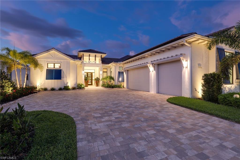 Better than new, this award-winning expanded Burano model has luxury appointments in every room! Quality Aercon commercial grade, high insulation construction. Wide open great room plan features an impressive foyer with soaring ceilings! A 24-foot wall of impact glass overlooks the course. The great room has a special backlit ceiling detail, built-in entertainment wall and dazzling custom bar with an under-counter Sub-Zero. Enjoy Karastan wood floors for a comfortable, casual lifestyle. The kitchen has three ovens, a 48-inch gas stove with Z-Line double oven plus Wolf wall oven, a Sub-Zero refrigerator and Asko dishwasher. Double thick quartz countertops in the open kitchen have a spice drawer and baking sheet storage. The primary suite has a triple cloud backlit ceiling, sitting area and built-in closet cabinetry and a massive custom walk-through shower. Full outdoor kitchen and dining area, spacious seating, with large TV over the outdoor fireplace. Laundry room has custom cabinets with backsplash, Electrolux appliances and a Bosch refrigerator. Full privileges at the TPC golf and pool clubs, full-service spa, restaurants, tennis courts, pickleball and fitness center.