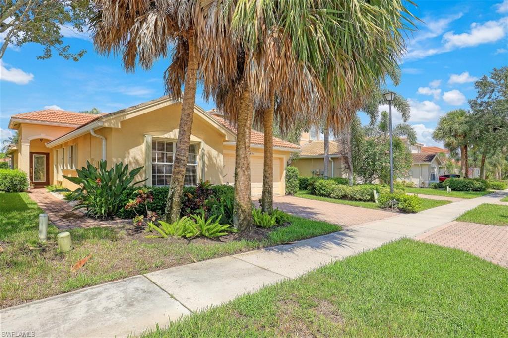 Looking for a perfect, move-in ready home in North Naples?  This is your blank canvas to personalize.  Saturnia Lakes is a gated single family community with terrific amenities and well situated in North Naples.    Freshly painted walls, new carpet in the bedrooms and fully tiled living areas. Open concept floor plan with vaulted ceilings, a formal dining room and eat-in kitchen.  Very functional kitchen with ample cabinetry, a pantry, granite countertops and stainless appliances.  The master bedroom has a coffered ceiling, large walk-in closet and a great view of the lake out back. A private office/den is ideal for work from home.  There is a large screened paver lanai to enjoy the beautiful mornings and evenings that SW Florida has to offer.  Just minutes to Founders Square with restaurants, shopping and entertainment.  Located in "A" rated school district.