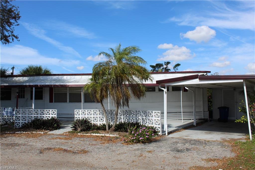Price to Sell and great investment property.  This beautiful manufacturer home is located in Mobile Manor and two bedroom and one bathroom.   Laminate floors and and enclosed lanai.   This property was rented for over $ 900 a month or it is a great place to call home.  Low HOA of $ 28.00 a month.  The location is great and walking distance to the Winn Dixie and shopping.    This wont last at this price.  AC was replaced two years ago.
