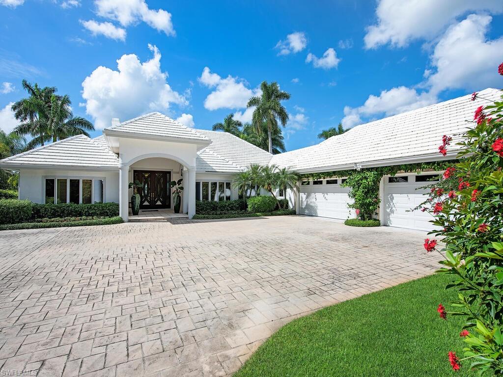 This updated 5 bedroom, 5 bathroom pool home is ideally situated on an estate lot and boasts stunning wide-canal views. A bright and open floor plan gives plentiful natural light, gorgeous wood flooring, fire place and modern kitchen cater to a discerning lifestyle. The private master retreat features dual sinks and a separate shower and picturesque soaking tub. The inviting outdoor living area encompasses a beautiful pool/spa, modern fire pit and provides a perfect space for entertaining. Port Royal is an exclusive, sought after community conveniently located within walking distance to Naples' white sand beaches and just minutes from 3rd Street South's and 5th Avenue South's fine dining and world-class shopping and entertainment. Port Royal Club membership eligibility.