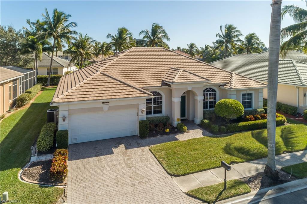 Look at this 4 bedroom 3 bath pool home in Reflection Lakes, an established gated community in popular South Ft. Myers.  Fresh interior paint brightens the neutral tone for easy decorating.  Crown molding accent volume ceilings and the many architectural features.  Formal dining and living rooms are situated in front.  The large, open great room, kitchen, and dinette overlook the solar-heated pool complete with benches.  An open kitchen has solid-surface counters, a roomy breakfast bar, tile backsplash, & pantry.  A pool bath connects to the lanai. Three bedrooms and two baths are on one side, with the spacious master suite on other side of the house. The master suite has a nice walk-in closet with plenty of shelving.  Just renovated, was the master shower to enable roll-in access, along with a new glass enclosure. For relaxation, there’s a garden tub as well.  The seller has added a whole house water filter system, storm shutters (electric on lanai) and a solar pool heater. A home warranty is transferrable.  Just around the corner from this quiet cul-de-sac street are the community amenities—clubhouse, pool, tennis, basketball, playground and more.  It’s all here waiting for you!