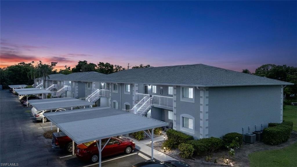 Beautifully maintained & Move in ready - 2nd floor condo centrally located to shopping, restaurants, and walking distance to Lakes Park where you can find multiple freshwater lakes for fishing and kayaking and miles of walking & biking trails. Summerlin Village is a quiet (no pets) neighborhood and just a 5 mile ride to the beautiful beaches & Sanibel Island. Feel safe and sound with electric hurricane shutter on patio offering you privacy & protection from future storms. Step inside and through you glass door front entry you will find vaulted ceilings, and a nice open floor plan great for entertaining with wood vinyl flooring throughout. The kitchen offers plenty of counter place with a breakfast bar and extra cabinet storage below. There is also an attic with pull down stairs for extra storage. Low HOA fee of $425/month includes cable, water, insurance, lawn care, pest control, trash removal, and sewer. There is also a community pool for those hot summer days to cool off in. This unit comes with 1 covered designated parking space with additional guest parking throughout the community. Come an experience one of the best valued condos close to the beach today!
