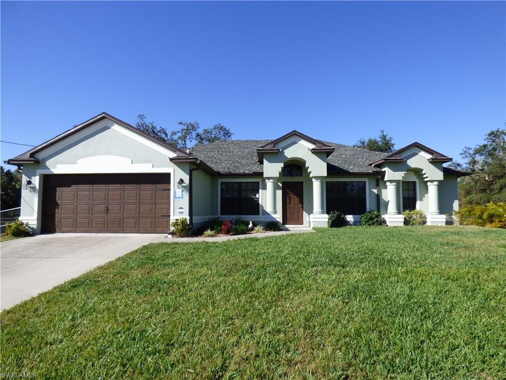2237 Square feet of living area in this 4 bedroom 2 bath on a fenced half acre lot on the end of the street, nicely landscaped, park like setting, fire pit, plenty of privacy and no traffic, backyard overlooks Charlie's Marsh Preserve, cathedral ceilings, plant shelves, formal living room or den plus family room and formal dining room, ceramic tile and Pergo floors throughout, freshly painted inside and out, granite tops in kitchen and baths, large breakfast bar with all appliances, pantry, water filtration system, dinette area, 42" cabinets with crown molding, stone tile backsplash, walk in closet in master bedroom with large master bath features dual granite sinks, walk in shower with rain head and separate garden tub, new well pump, 35 foot screened lanai under truss, new dimensional shingle roof in 2017, indoor laundry room with washer and dryer,automatic irrigation system, storm panels for openings, security system, excellent move in ready condition.
