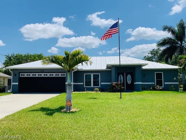 Location, Location, Location! A must see property located in a highly desirable area of Cape Coral amongst beautiful million dollar homes. Enter this gorgeous updated smart home through custom painted double doors. Step onto the elegant luxury vinyl floors throughout, and admire the custom paint in this 3 bedrooms, 2 bath pool home, featuring a den, and 2 car garage with epoxy floors. The organized remodeled kitchen is open and spacious with black stainless appliances, quartz counter tops, custom cabinets in center island, and a large pantry with pull out shelves. This smart home has a security system which includes alarm, motion sensors, keyless entry, cameras, and intercom which can be controlled by your smart phone or by the Smart Pad affixed in the home. Additional upgrades include, salt system pool with heater, automatic sprinklers, hurricane proof windows, doors, and garage door, LED lights on garage with changeable colors, metal roof, large ceiling fans, custom paint, Jack and Jill bathroom, fenced yard, flag pole, manicured property with all assessments in and paid. This home is spotless and has it all! Schedule your showing today. This Surfside area property will not last.