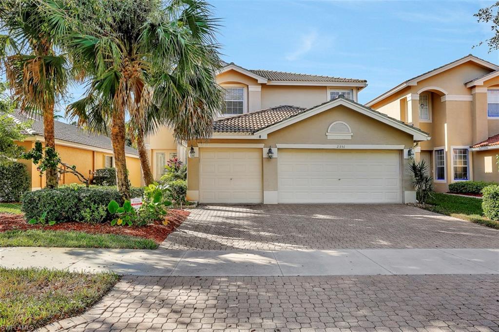 LIKE BRAND NEW! This spacious "Flamingo" floorplan home features just over 2900 Sq Ft, 4 Bedrooms, Den, 3 Baths, & a 3 CAR GARAGE! From the moment you walk in the glass front doors, you are greeted with Rich Moldings, Designer Lights & Fans, Plantation Shutters, Diagonal Tile floors, Hurricane Impact Sliding Glass Doors, Extended Screened/Covered Lanai, and a BRAND NEW CUSTOM KITCHEN with Rich Wood Cabinets, Level V Granite, Tile Backsplash, and Stainless Steel Appliances. There is also a full bath and den/5th bedroom downstairs.  Upstairs, you will find wood floors throughout all the bedrooms, and an over sized Master Suite including a Sitting Area, Large Walk In Closet, and Bath with Dual Sinks, Soaking Tub, and Walk In Shower.  The HUGE backyard can be fenced in for the kids/pets or you can build a custom pool. Saturnia Lakes offers a resort pool, lap pool, kiddie pool, hot tub, fitness room, dance studio, internet cafe, saunas, massage rooms, billiards room, grande ballroom, 4 clay tennis courts, playground, basket ball court, putting green, & miles of walking paths. HOA fees INCLUDE Landscaping, Irrigation, Amenities, Alarm Monitoring, Cable TV, Internet, & Phone!