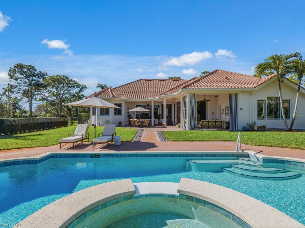 This 2006 custom built AR Homes estate home is set on 1.77 beautiful acres in the perfect location in the heart of the sought-after Pine Ridge community. Quiet and serene, the outdoor living space and pool give way to elegant, landscaped and fully fenced property with fruit trees, shade and sun. Perfect for kids, dogs, sports and entertaining. 
Offering 5 bedrooms, a study, and 3.5 baths across 4,102 SF under air, the thoughtful layout features the primary suite on one side with luxury tub and separate shower, a wing with 2 bedrooms and a Jack-and-Jill bath on the other, and 2 additional bedrooms sharing a full bath in the rear. The study is ideally located at the front of the home.
An open, airy floor plan with soaring ceilings flows seamlessly from the entry and living room to the remodeled kitchen and family room, extending through cornerless sliders to the outdoor living area and pool
There is plenty of room to add a guest house, tennis or pickleball courts, or expand the house if desired. 
A 3-car garage provides abundant storage. Finally a beautiful, one story, move-in-ready home in the heart of Pine Ridge on close to 2 acres for under $5 million!