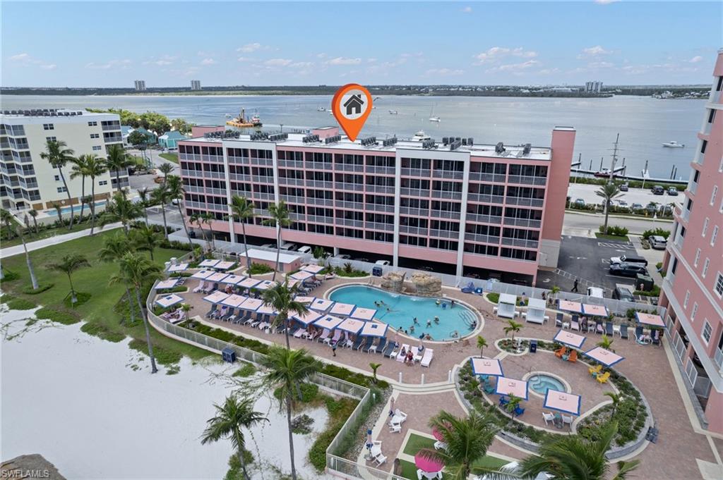 BEACHFRONT, TURNKEY CONDO RIGHT ON THE BEACH at Pink Shell Resort & Marina!  This is a professionally maintained 3rd floor condo/hotel unit in the Sanibel View Building at the resort. This unit features a king bed, kitchenette with granite countertop, small refrigerator, sink, microwave, coffeemaker and toaster.  Vinyl plank flooring, flat-screen TV, and high-speed internet rounds out the beauty of this unit.  The luxurious bath has double sinks and large walk-in glass shower.  As part of the resort's mandatory on-site rental and management program, this property offers hassle-free rentals for you!  As an owner, you have 28 days annually (14 in season/14 off-season) to enjoy your own unit.  The other days of the year will generate rental income through the management team.  Owners always have full access to enjoy the amenities all year round, including beach chairs and umbrellas, 3 beachfront pools, spa, restaurants and bars.  And don't forget the marina with watersport rentals and fishing excursions!  Just down the street at the northern tip of the island, is the beautiful, serene and natural Bowditch Park to walk the nature trails, bird watch, or sit on the beach and watch the boats float by. Or visit the bustling Fort Myers Beach town square, where it's happening all the time!  Short walks to both! Pink Shell Resort and Marina is perfect for a personal getaway along with reliable rental income.  Don't miss this unit!