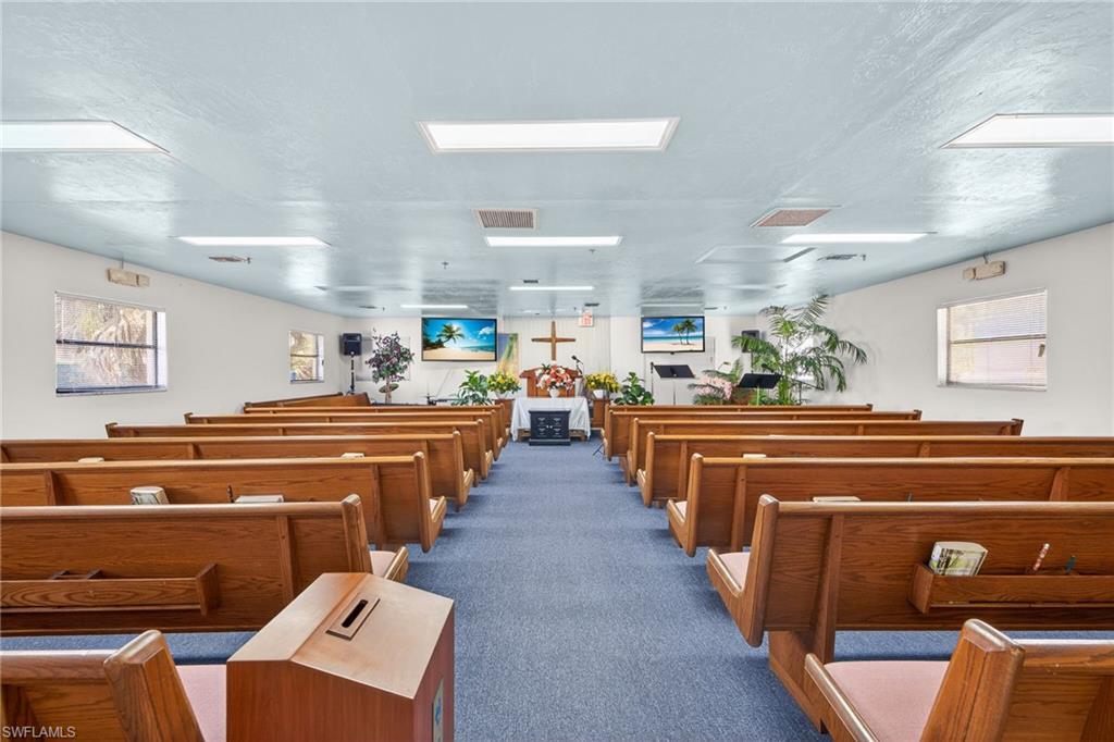 NOW FOR SALE! TAKE ME TO CHURCH!! Established church building with plenty of parking, private pastor's office, conference room, vestibule entry with kitchen, 2 bathrooms, nave with center isles and 7 rows of long pews on each side. Building and interior is in great condition and property is ready for immediate use! Offered turnkey with everything you need to get started! Up to 25 parking spots. Great location to grow an active and loyal congregation! Call for your showing today!