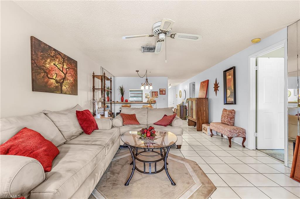 Welcome home to paradise in this fabulous main-level condo, perfectly located in the heart of Naples, close to everything you need for a happy, carefree lifestyle. Enjoy the convenience of being just minutes from beautiful beaches, top-rated restaurants, shopping, and entertainment.

Unwind on the lanai with serene views of the pool, lake, and golf course, an ideal setting for relaxation any time of day. Inside, you’ll find two generously sized bedrooms and a cozy, versatile floor plan ready for your personal style.

Pull right into your private covered parking space and step just a few feet to your front door. Bright, airy, and ideally positioned within the building, this condo offers comfort, convenience, and location all in one perfect package.