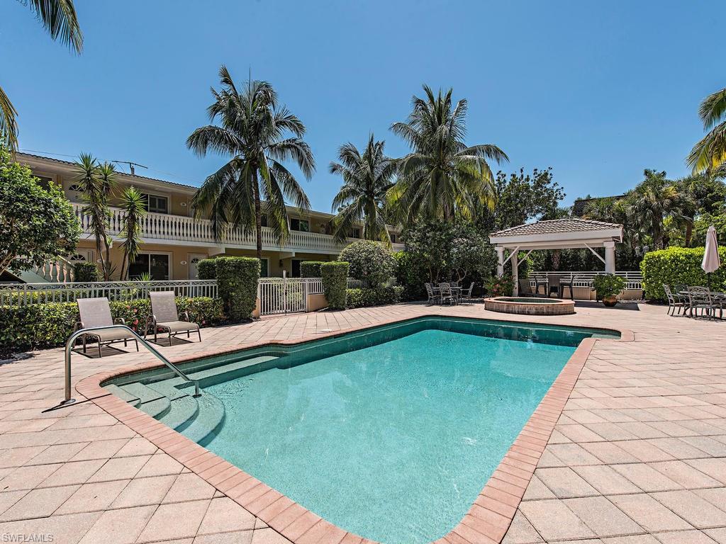 Rarely Available First Floor Corner Unit gated Complex in the Heart of Olde Naples.This Unit has been Upgraded and is Ready for Immediate Occupancy.Mediterranean Style Complex with Large Pool,Jacuzzi and Barbecue Area. Also Rare for Olde Naples this Complex Allows Pets and has a Washer & Dryer in the Unit.Walk to all Downtown Amenities 5TH Ave Third Street Beaches Shopping and More.This is the Perfect Complex for People that are Active and want to be Close to everything.This Could be your Home your personal Retreat or it can be Rented up to 12 times a Year.