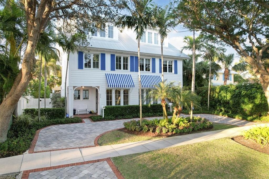 NO FLOODING! “Beach Bungalows of Naples” exudes the perfect blend of Magical Charm, location and building standards! Live in the walkable Heart of Naples, just 4 short blocks to the Beaches and 2 blocks to world class 5th Ave. The HOA includes POOL/YARD/INSURANCE for carefree living. Penned by renowned architect Jeff Harrell to offer the finest building construction: concrete block on all floors, impact windows, icynene insulation, top wind metal roof protection, Hardi-plank exterior. Interiors match the quality with wide plank oak floors, tongue and groove cottage ceilings, wide moldings, Subzero refrigeration, gas cooking, stone counters and banks of windows to offer a light and bright ambiance throughout. Serene outdoor living is the essence of charm with Southwestern exposure, covered seating and dining, a romantic heated saltwater pool, trickling water feature, fireplace, grill, mosquito mister, sunshade, Chicago brick, dog fence, back alley private garage parking and Total Privacy! There is a semi-finished Bonus Room above the garage. Stroll to the beach with neighbors for orange sunsets. The very BEST of Old Naples!