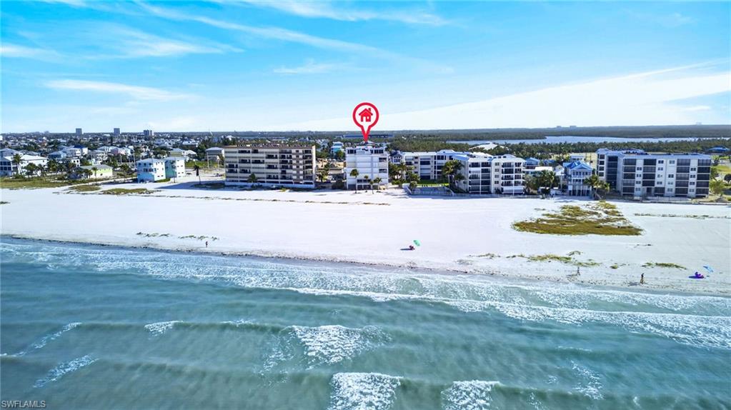 Rarely available Direct Beach Front condo with stunning views of the sandy beachs of Fort Myers Beach and the Gulf of America. Two Lanai's! A spacious main lanai off of the open family room and also another private lanai off of your Primary bedroom. This exceptional condo offers the ideal combination of luxury, comfort, and convenience. Step inside to discover a thoughtfully updated interior featuring modern finishes, an open-concept layout, and abundant natural light throughout. The updated kitchen features stylish cabinetry, upgraded countertops, and newer appliances, making it perfect for entertaining or relaxing after a day at the beach. Additional updates throughout the home provide a fresh, move-in-ready feel designed for effortless coastal living.  Located in a highly desirable area of Fort Myers Beach, this property offers convenient access to local dining, shopping, entertainment, marinas, and all the island attractions while still providing a peaceful beachfront retreat. Whether you are searching for a full-time residence, vacation getaway, or investment opportunity, this exceptional property delivers the ultimate Southwest Florida lifestyle. Don’t miss your chance to own a slice of paradise directly on Fort Myers Beach.