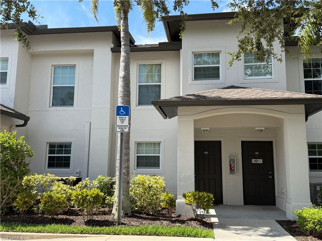 Very well maintained partially furnished 2 bedroom, 2.5 bathroom with loft and beautiful water view featuring tile on the main floor and upgraded carpet on the second floor. Home is equipped with 4 ceiling fans,  new AC and carpet in 2024, new stackable washer and dryer, kitchen faucet and exterior paint in 2025. Located conveniently within walking distance to restaurants, shops. medical facilities and so much more! Easy access to I-75 and Naples beaches. Out of state owners and very limited annual usage.