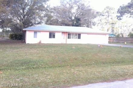 Great street with a boat ramp. Home needs work.