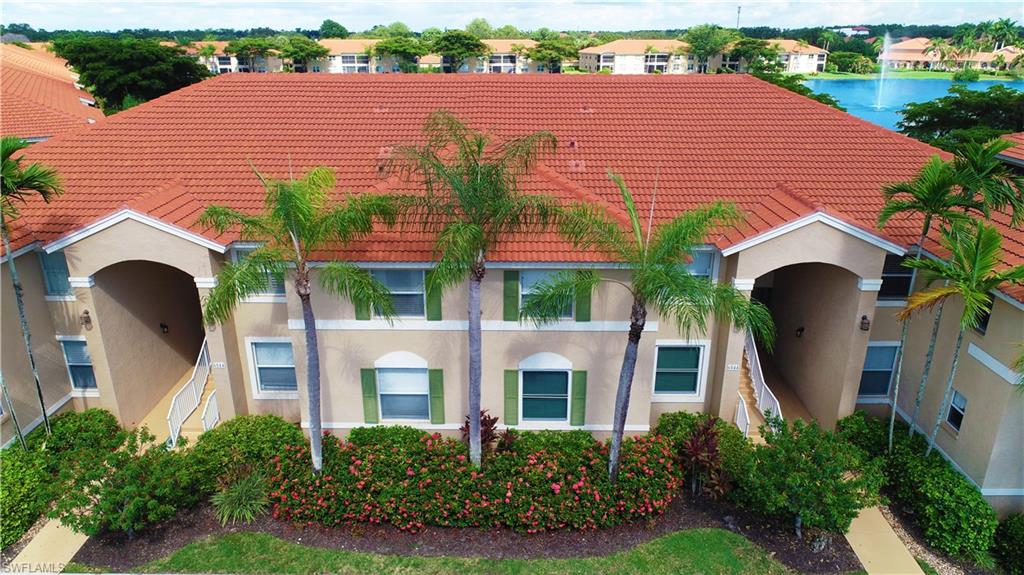 BEAUTIFUL, MOVE-IN READY! Located in the highly desirable North Naples community of Huntington Lakes, this beautiful 1st floor, 2 bedrooms, 2 bath condo is being sold "turnkey furnished" and offers spectacular views of the lake with water fountain. This home is both light & bright with a spacious living room opening out onto the screened lanai. Newer appliances with ceiling fans, window treatments & blinds, along with carpet and tile, eat-in kitchen with hardwood cabinets, beautiful quartz counters and newer back splash and pass through to dining area are just a few of the amenities offered. Master Suite equipped with separate tub, walk-in shower, double vanities and walk in closet. Laundry and storage room, NEW ROOF in 2018, New Hurricane windows in 2022 help reduce insurance costs. A 1 car detached garage all this just minutes from Mercato, RSW airport and world-renowned beaches of Naples FL. Make this your perfect get away home.