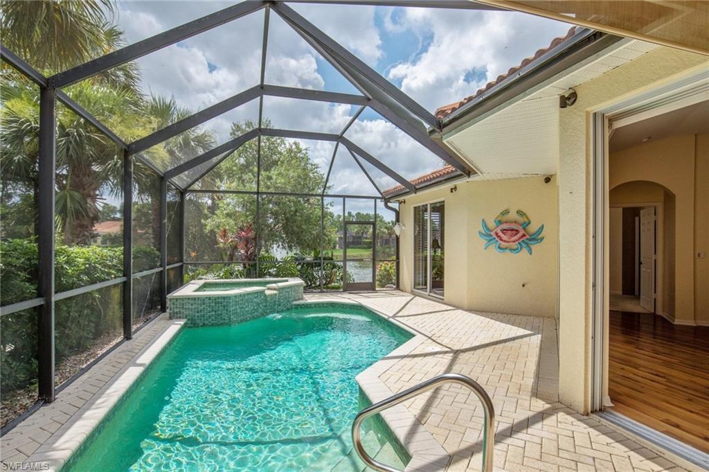 V.2665 - Now offered furnished!  The Portobello V features an open concept design which encompasses over 1,900 square feet and boasts a gourmet kitchen with stainless steel appliances, a spacious center island and a cozy breakfast nook.  The master suite overlooks the pool, spa and lake and features California Closets, dual vanities and a separate tub and shower.   Guest suite with custom closet system and a grass cloth accent wall. Den/office with custom built in cabinetry which can be easily converted to a 3rd bedroom.  Plantation shutters are carried through the entire residence adding a level of style and sophistication.  The screen enclosed lanai features a covered dining area with an outdoor kitchen which overlooks the pool and spa and comes equipped with an auto fill/drain system.  Pull down stairs in the garage lead to additional attic storage. New A/C installed in 2015. Residents enjoy a variety of activities including a lagoon pool, lap pool, spa, sauna, tennis center (w/ pro), fitness center, fitness classes, water sports and more!  Bronze Commons Club Membership is included with this property!