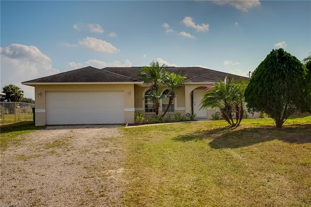 Move in ready! This one is not to be missed. Beautifully upgraded, with laminate and carpet throughout, volume ceilings, crown molding, stainless steel appliances, tiled back-splash and much more. This 3 bedroom 2 bathroom home is only minutes away from the new Publix. Don't wait, call for a showing today!