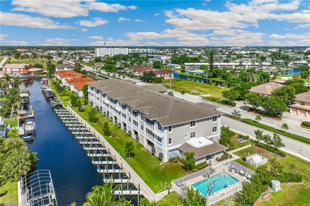 Introducing Bacino Vista, Cape Coral’s only new Gulf-access condominium development — available in its entirety. This rare offering includes all 16 luxury residences, each with deeded boat slips and direct access to the Gulf of Mexico. Perfect for a boutique rental portfolio, private compound, or resale strategy, Bacino Vista represents the pinnacle of Florida waterfront investment. Each Bacino Vista residence embodies refined coastal living with premium finishes and serene canal views.
Residence Highlights: 2–3 Bedroom Floor Plans, 9-ft Ceilings & Recessed Lighting, Porcelain Tile Throughout, Chef-Inspired Kitchens with Granite Counters & Stainless Appliances, Walk-In Pantries & Breakfast Bars, Spa-Style Primary Baths with Rainfall Showers, Private Screened Lanais Overlooking the Canal.
Community Amenities: Heated Saltwater Pool, Deeded 18’ Boat Slip for Every Unit, Two Assigned Garage Spaces per Residence, Private 6’×8’ Storage Units, Common Elevator & Guest Parking.
Ideally located minutes from downtown Cape Coral, residents can walk or boat to waterfront restaurants, boutique shops, and entertainment. Bacino Vista is positioned for long-term appreciation within one of Florida’s fastest-growing coastal markets. Major city enhancements underway include the Cape Coral Yacht Club redevelopment, public beach expansion, and Bimini Basin revitalization.